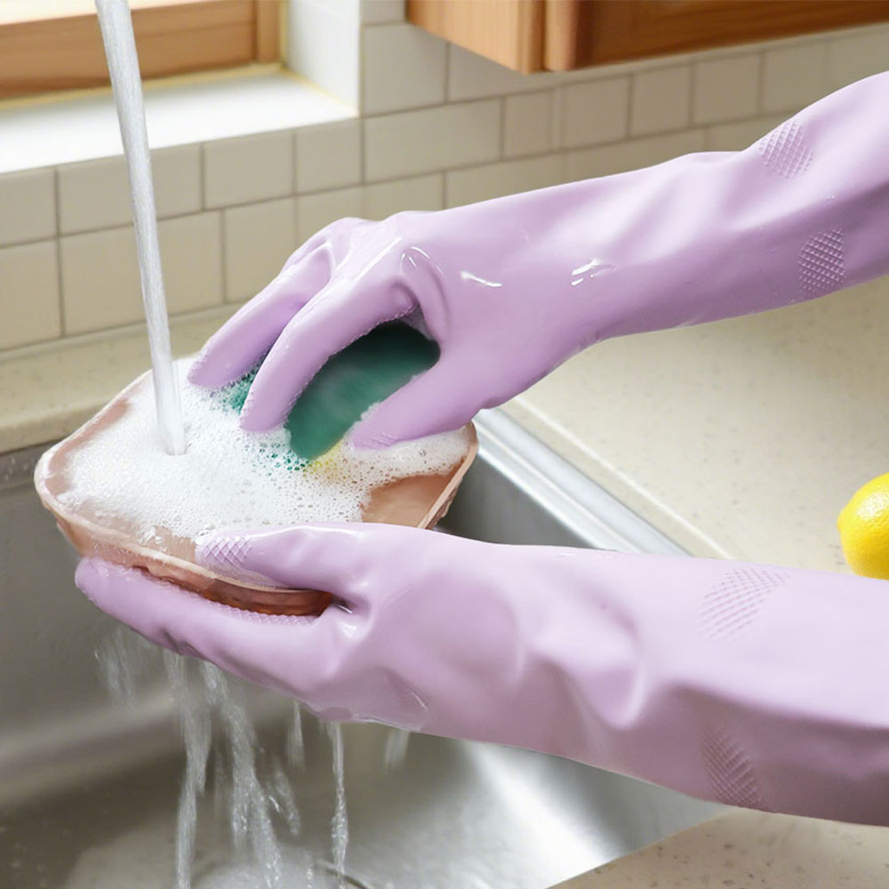 washing dish with rubber glove