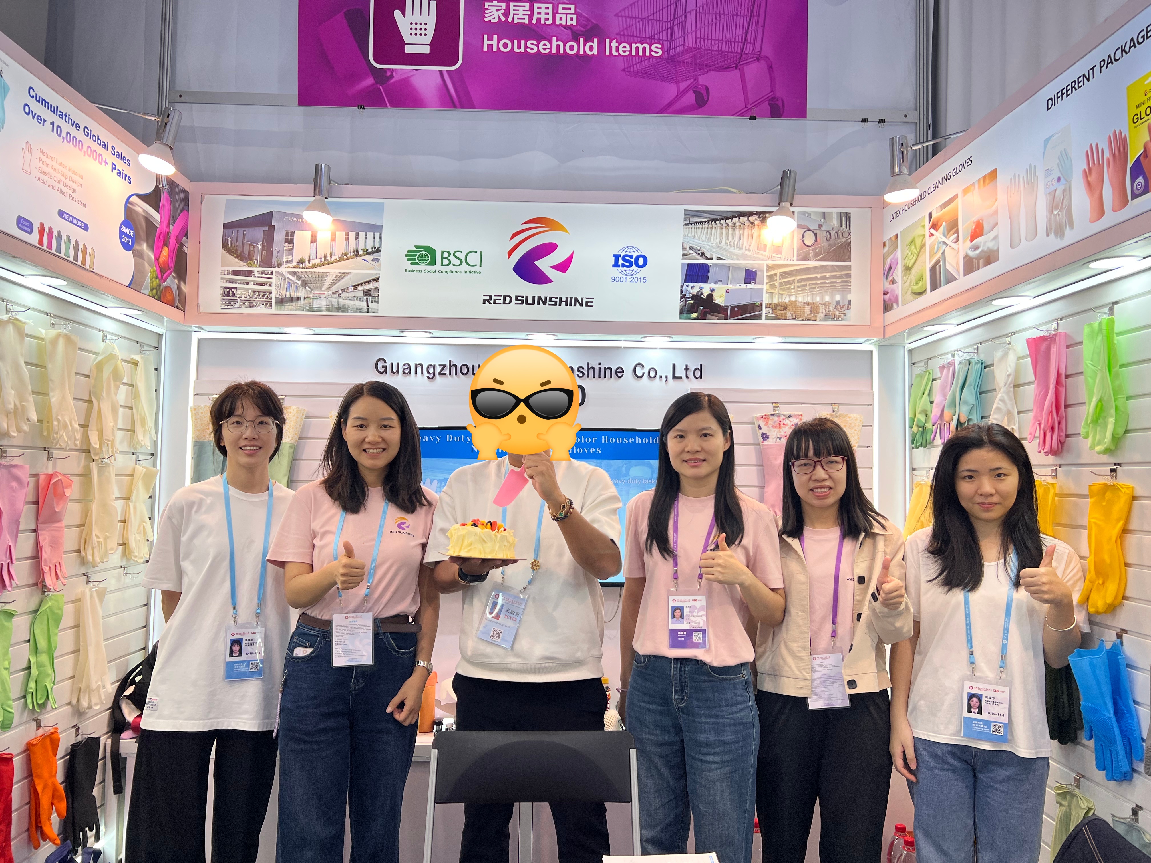 Birthday celebration at Guangzhou Red Sunshine booth during Canton Fair — staff and visitors singing