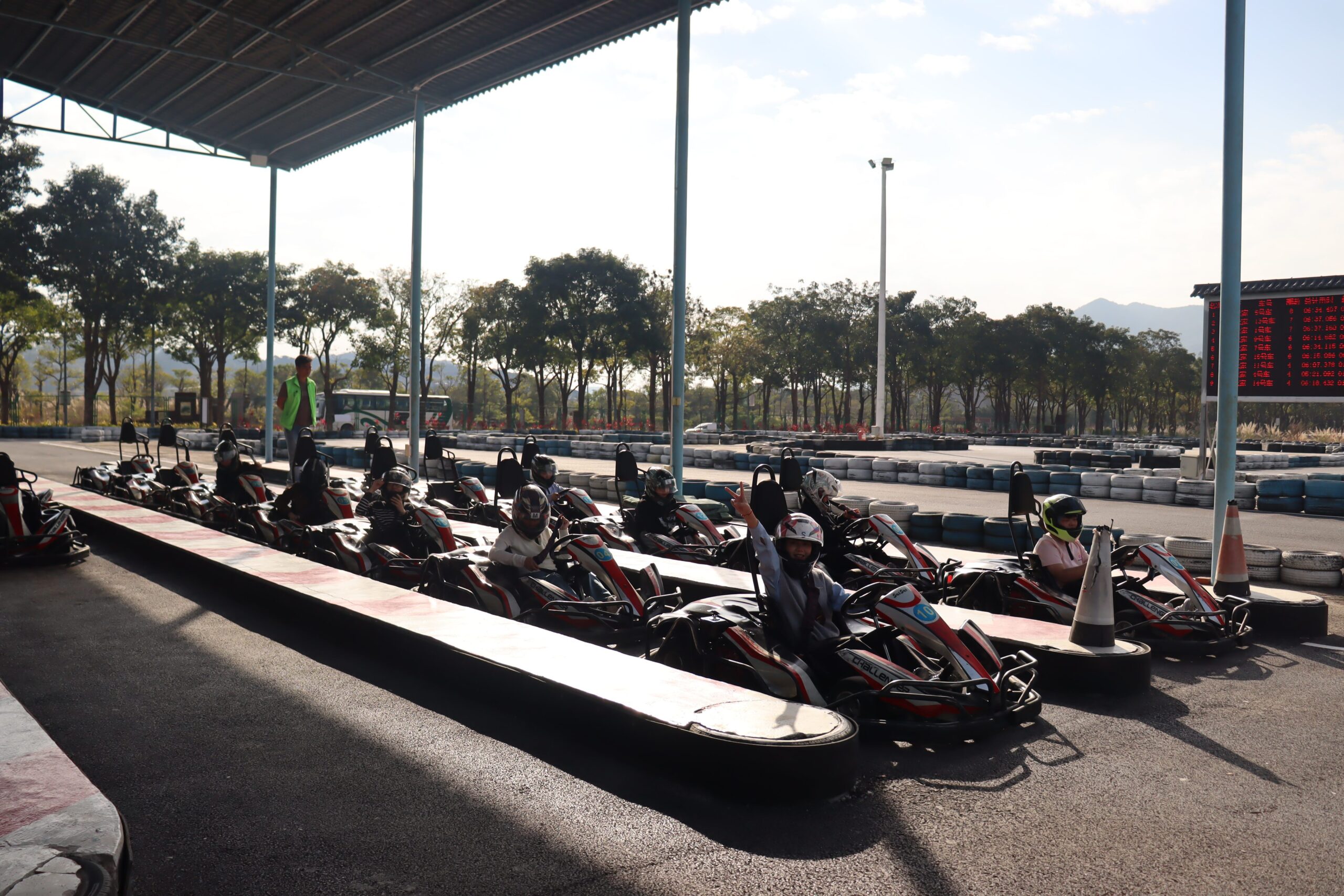 Red Sunshine factory team practicing quick-response coordination at a team event.