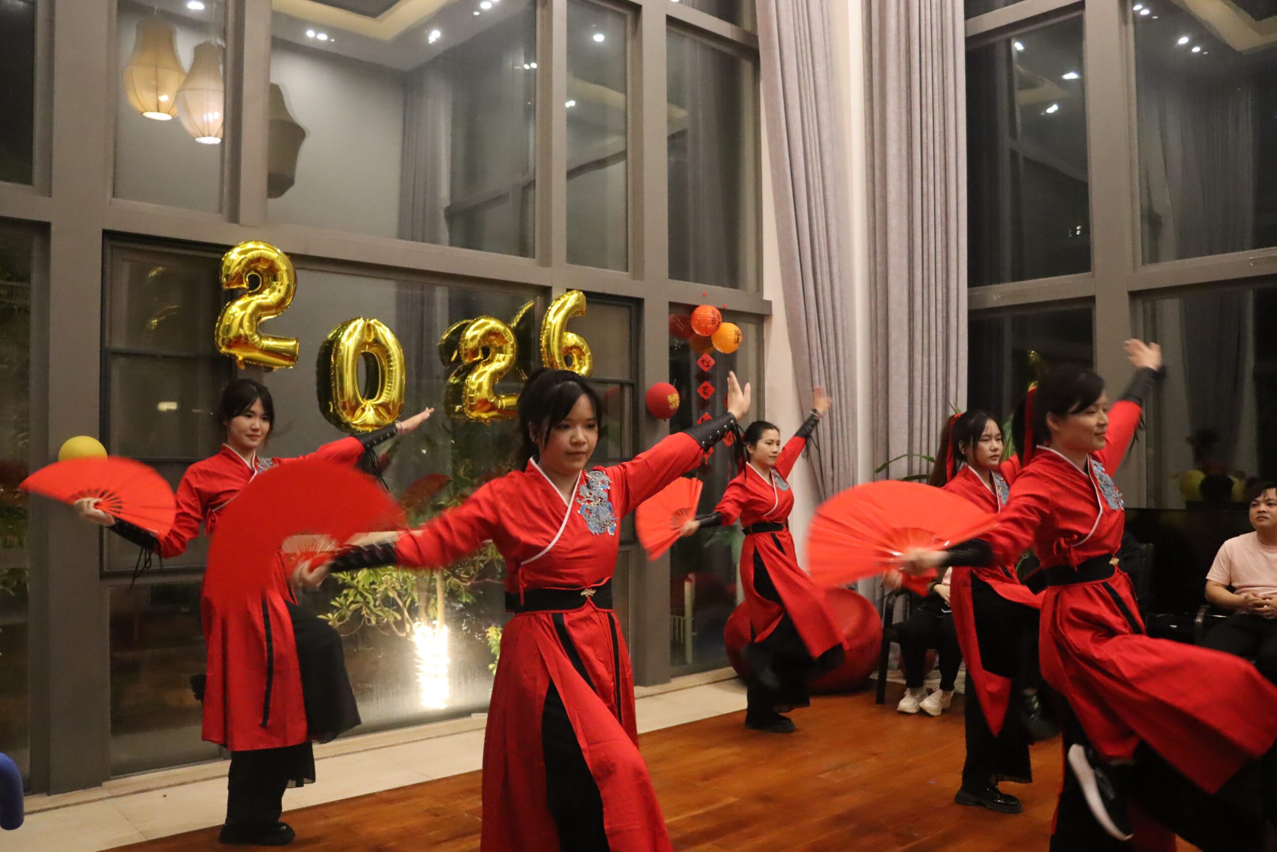 Traditional fan dance at the Red Sunshine year-end gala in Guangzhou, China.